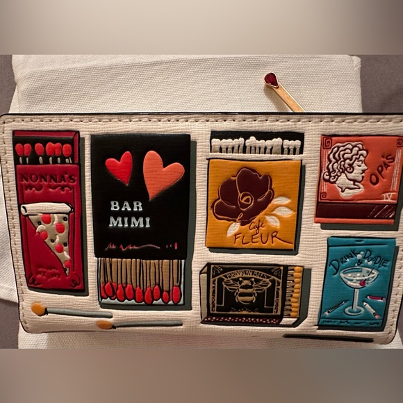 Kate Spade
Morgan Matchbox Embossed Small Slim Bifold Wallet
$118 - Picture 3 of 5